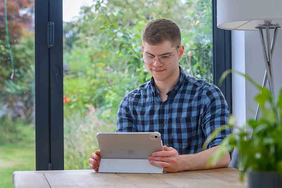 man looking at laptop